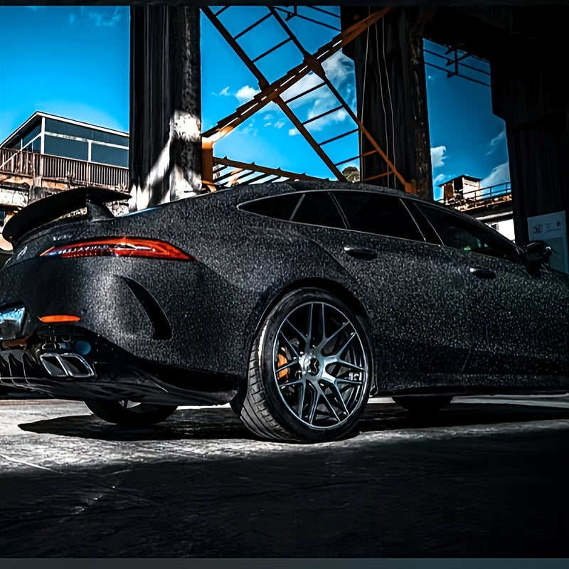 Elevate the look of your vehicle with this versatile universal fit PVC vinyl film. The diamond grain black car wrap adds a touch of style with its full body adhesive sticker, providing a sleek and modern appearance to your car.