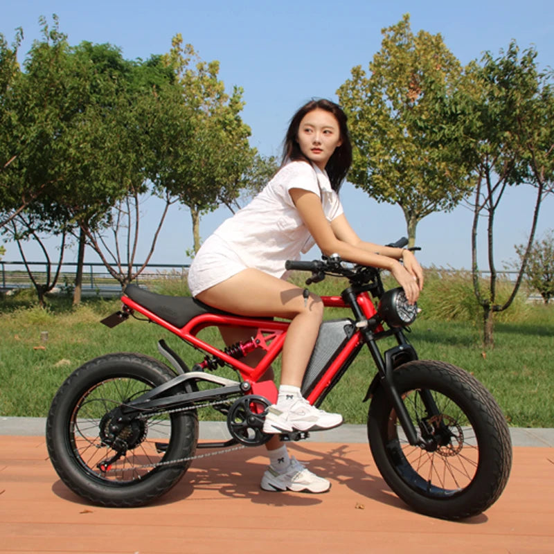 Ride with power and comfort on this 2000w/1500w electric mountain bike. The Stealth Bomber design offers increased motor power and shock absorption, perfect for adult riders seeking an adventurous biking experience!