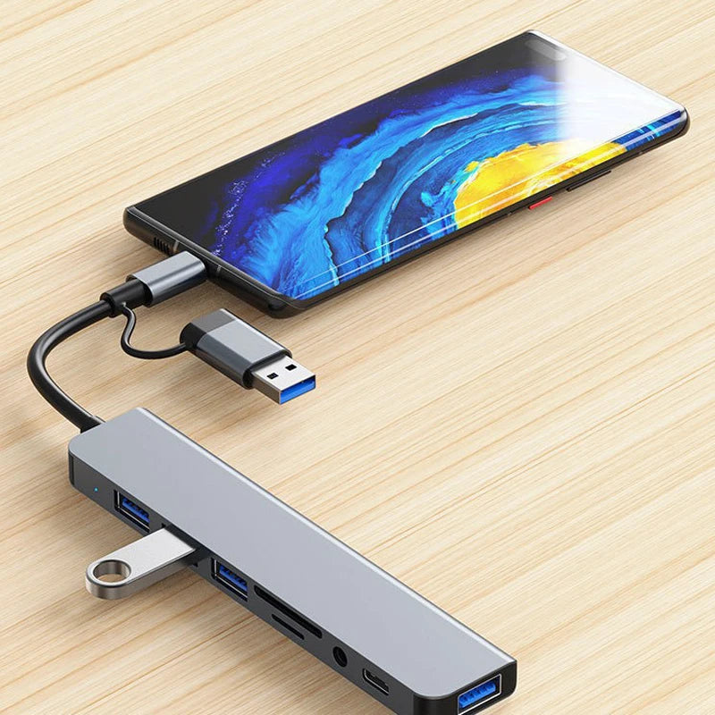 Expand your connectivity with this 8-in-2 USB + Type-C hub docking station—featuring multiple USB ports and a convenient card reader for seamless device access! Card Reader Laptop Tablet Phone Disk Converter