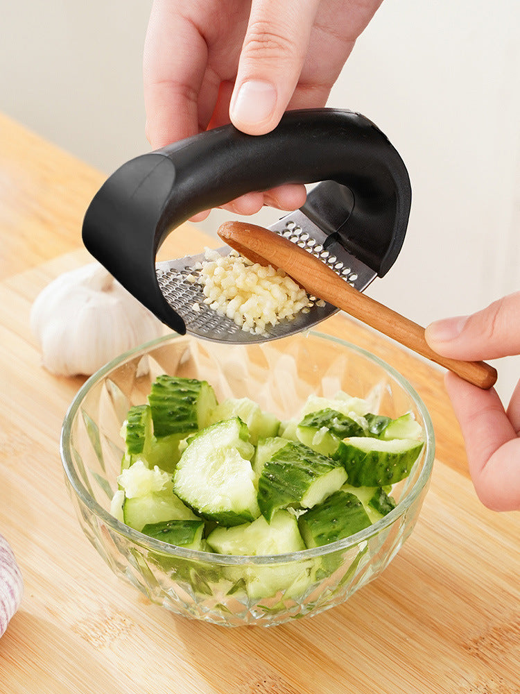 Effortlessly crush anything with this durable stainless steel manual press—easy to use and perfect for adding fresh flavor to your dishes!