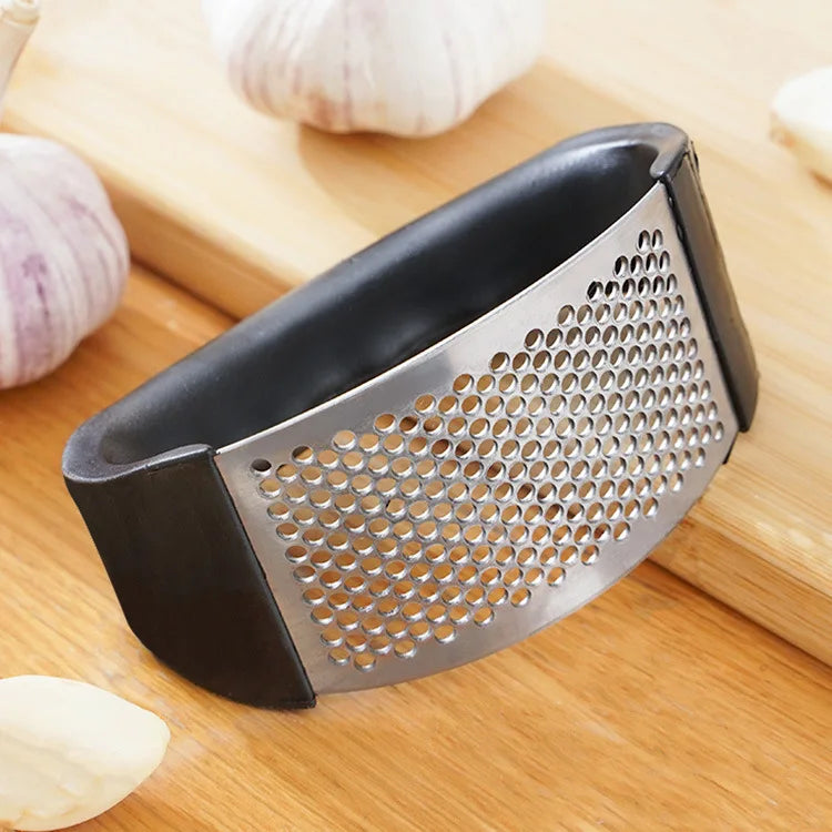 Effortlessly crush anything with this durable stainless steel manual press—easy to use and perfect for adding fresh flavor to your dishes!