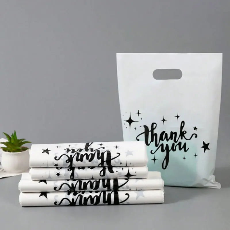 30/50/100PCS plastic thank-you bags with handles, small commercial shopping bags, gift bags, retail boutiques, clothing stores
