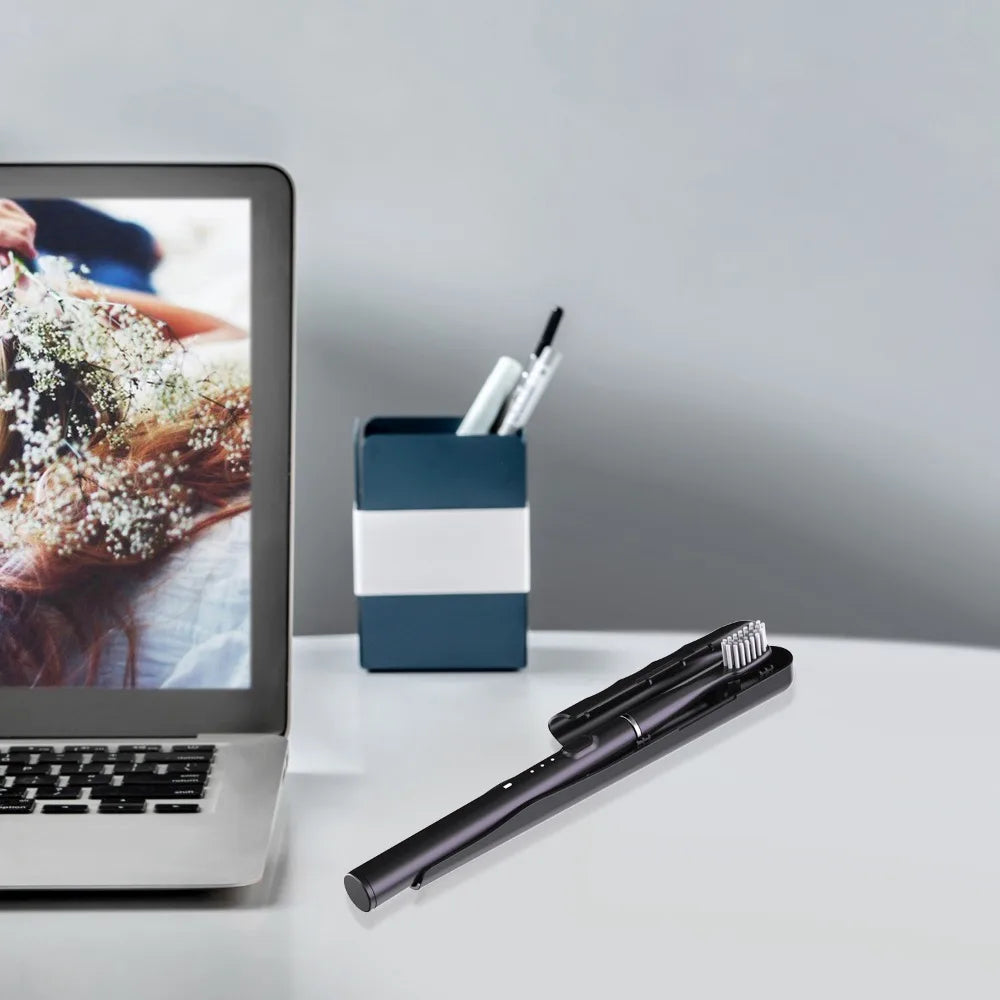 Keep your smile fresh on the go with this portable USB rechargeable electric toothbrush—comes with 6 replaceable brush heads for lasting clean and convenience!