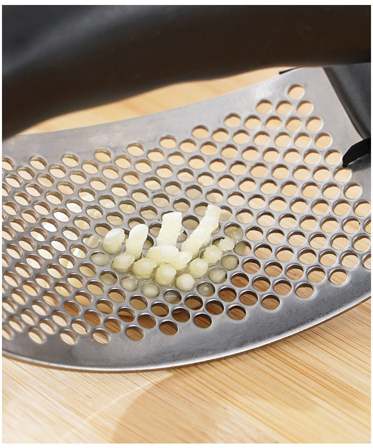 Effortlessly crush anything with this durable stainless steel manual press—easy to use and perfect for adding fresh flavor to your dishes!
