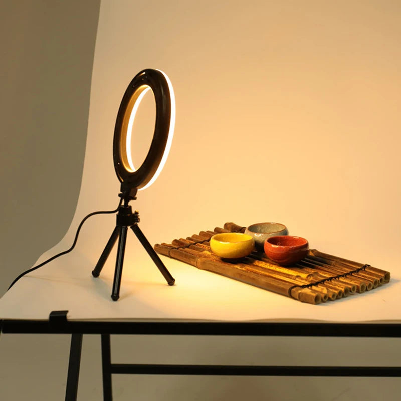 Light up your shots with this 6-inch ring light paired with a sturdy tripod—perfect for flawless selfies, videos, and more!