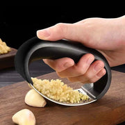 Effortlessly crush anything with this durable stainless steel manual press—easy to use and perfect for adding fresh flavor to your dishes!