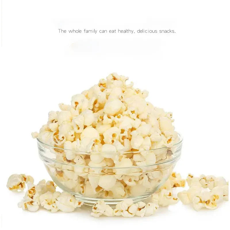 Indulge in quick and tasty snacks at home with this premium electric popcorn maker. The mini hot air corn popper features fast heating and a stylish design, making it perfect for convenient and delicious popcorn treats!
